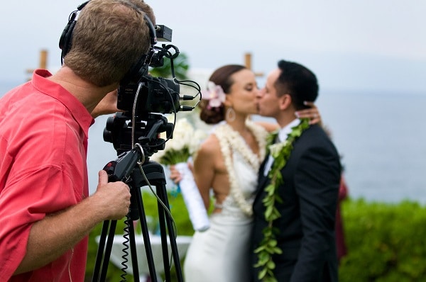 Wedding video hire ave services audio visual, live streaming and relay for additional guests into a marquee or side building. We're able to setup multiple cameras and audio so all of your guests can see and experience the wedding ceremony.